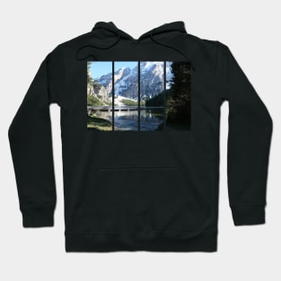The fabulous alpine lake of Braies in the Dolomites (Bolzano). Lovely place in the Italian Alps. Boats on the water. Reflections in the water. Sunny spring day. Trentino Alto Adige Hoodie